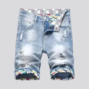 Ripped men's denim shorts